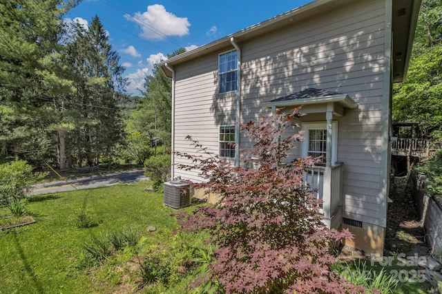 619 Beaverdam Rd, Asheville, NC 28804 - view of side of home with central air condition unit and a yard