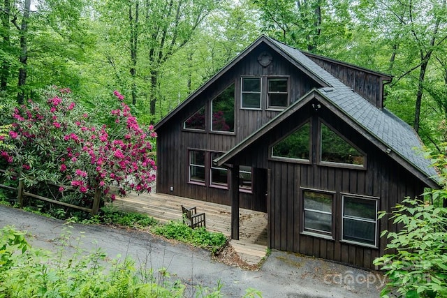 680 Timberlane Dr, Boone, NC 28607 - rustic home featuring a deck and roof with shingles