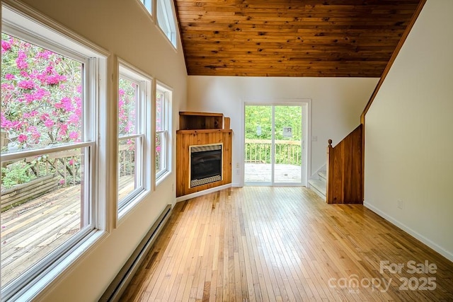 680 Timberlane Dr, Boone, NC 28607 - unfurnished living room with hardwood / wood-style floors, baseboards, a fireplace, stairs, and wooden ceiling
