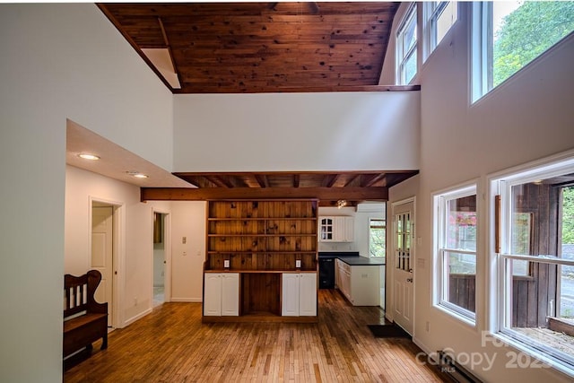 680 Timberlane Dr, Boone, NC 28607 - kitchen with high vaulted ceiling, wooden ceiling, white cabinets, open shelves, and light wood-style floors