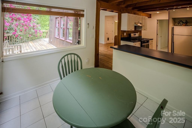 680 Timberlane Dr, Boone, NC 28607 - dining area featuring baseboards and tile patterned flooring