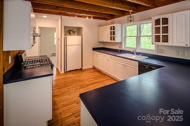 680 Timberlane Dr, Boone, NC 28607 - kitchen with freestanding refrigerator, a sink, dark countertops, beam ceiling, and light wood-style floors
