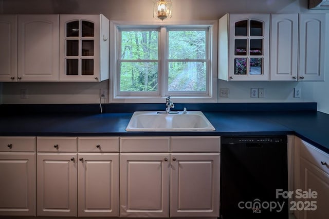680 Timberlane Dr, Boone, NC 28607 - kitchen with black dishwasher, dark countertops, a sink, white cabinetry, and glass insert cabinets