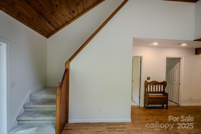680 Timberlane Dr, Boone, NC 28607 - stairs featuring vaulted ceiling, baseboards, wood finished floors, recessed lighting, and wooden ceiling