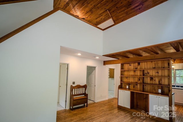 680 Timberlane Dr, Boone, NC 28607 - kitchen featuring wood-type flooring, wooden ceiling, a sink, high vaulted ceiling, and recessed lighting