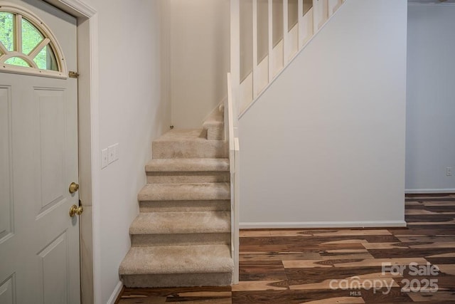 680 Timberlane Dr, Boone, NC 28607 - staircase with wood finished floors and baseboards