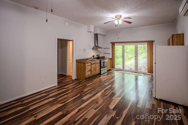 680 Timberlane Dr, Boone, NC 28607 - unfurnished living room featuring ceiling fan, dark wood-type flooring, a wall mounted air conditioner, a textured ceiling, and a sink
