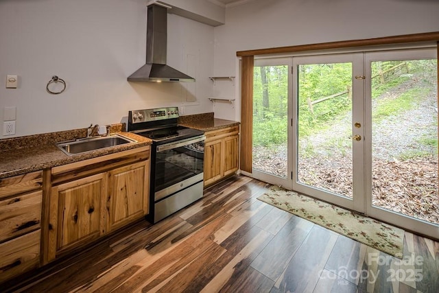 680 Timberlane Dr, Boone, NC 28607 - kitchen featuring stainless steel electric range, wall chimney range hood, a sink, dark wood-style flooring, and dark countertops