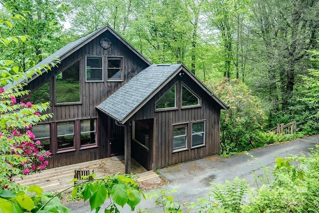 680 Timberlane Dr, Boone, NC 28607 - rustic home featuring roof with shingles and a wooden deck