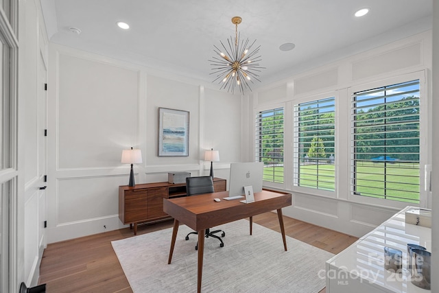 1405 Waxhaw Marvin Rd, Waxhaw, NC 28173 - home office featuring a decorative wall, a chandelier, wood finished floors, and recessed lighting