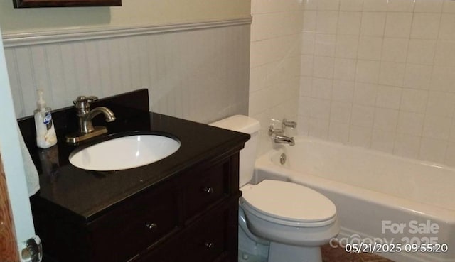 33 Horse Cove Rd, Canton, NC 28716 - bathroom with toilet, shower / bathtub combination, vanity, and wainscoting
