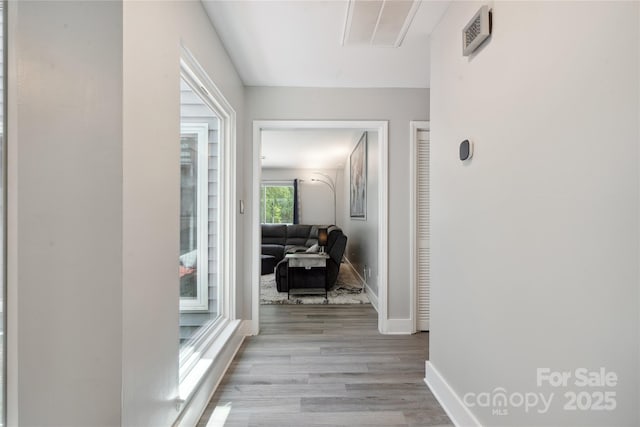 3807 Sweetgrass Ln, Charlotte, NC 28226 - hallway featuring light wood finished floors and baseboards