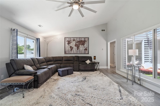 3807 Sweetgrass Ln, Charlotte, NC 28226 - living area with wood finished floors, ceiling fan, vaulted ceiling, and baseboards