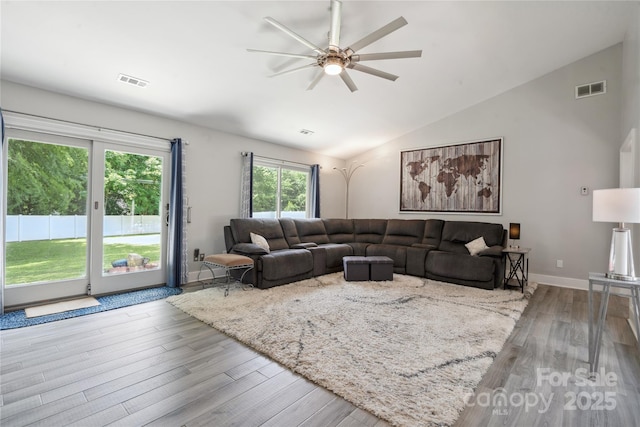 3807 Sweetgrass Ln, Charlotte, NC 28226 - living area featuring a ceiling fan, wood finished floors, vaulted ceiling, and baseboards