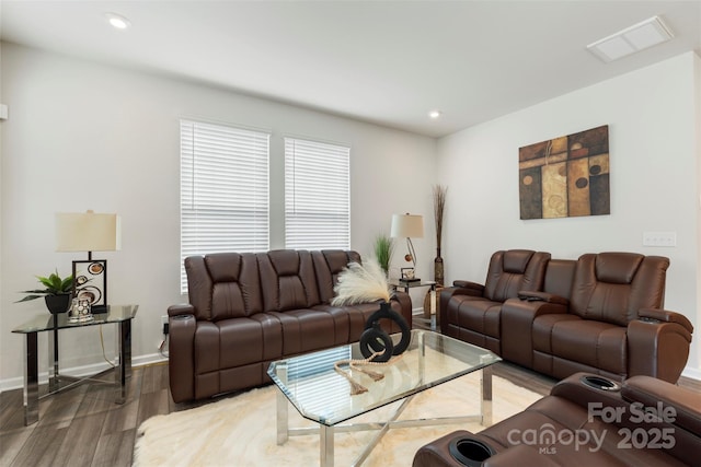 13327 Savaine St, Charlotte, NC 28278 - living room featuring wood finished floors, baseboards, and recessed lighting