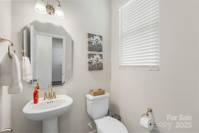 13327 Savaine St, Charlotte, NC 28278 - bathroom with toilet and a sink