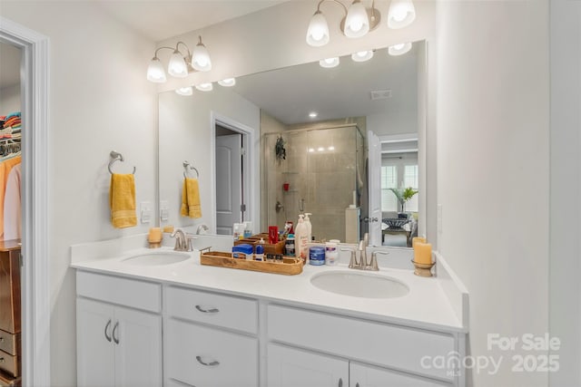 13327 Savaine St, Charlotte, NC 28278 - full bath featuring double vanity, a shower stall, and a walk in closet