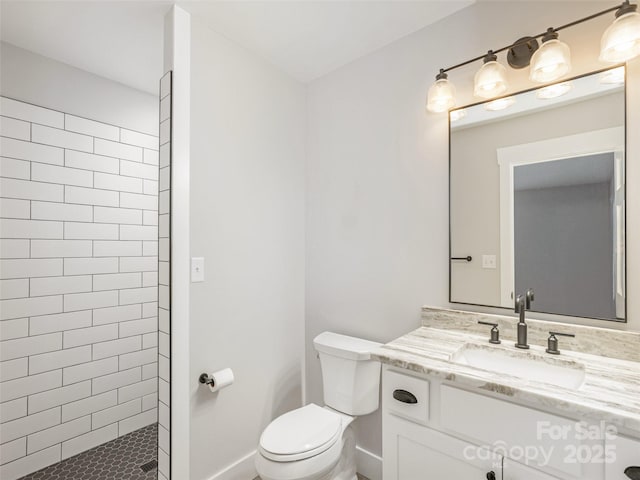 330 Balsam Rd, Hendersonville, NC 28792 - full bathroom featuring vanity, tiled shower, toilet, and baseboards