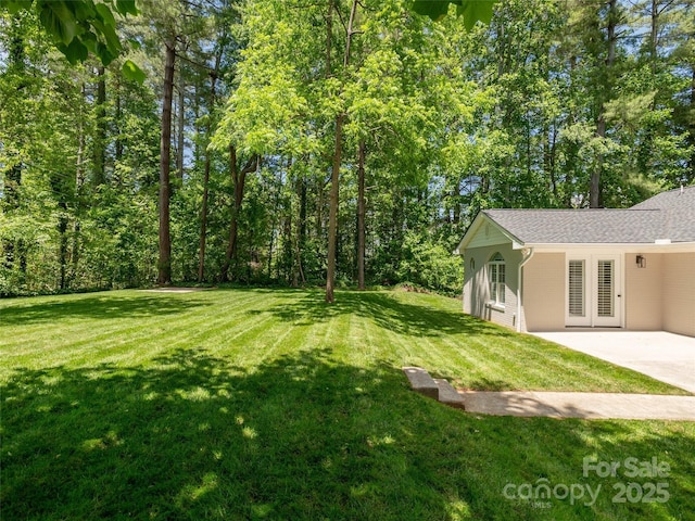 330 Balsam Rd, Hendersonville, NC 28792 - view of grassy yard with driveway and french doors