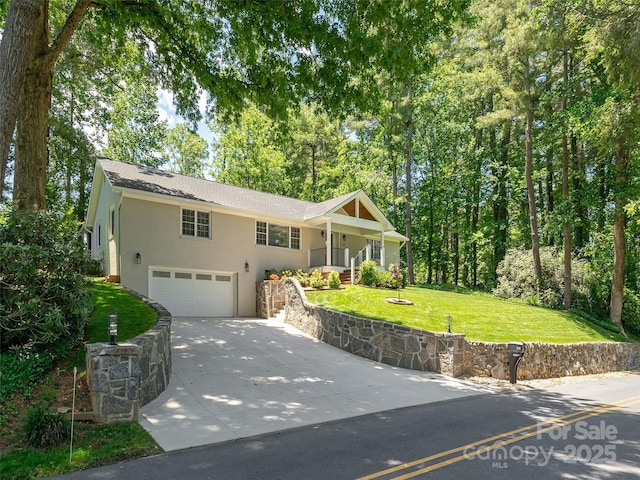 330 Balsam Rd, Hendersonville, NC 28792 - ranch-style house with driveway, a garage, a front yard, and stucco siding