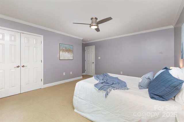 121 Quality Dr, Mount Holly, NC 28120 - bedroom featuring crown molding, light carpet, baseboards, a ceiling fan, and a closet