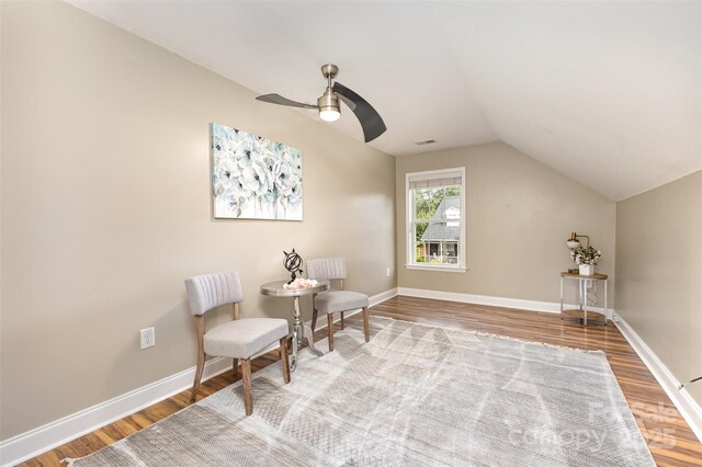 121 Quality Dr, Mount Holly, NC 28120 - sitting room with wood finished floors, lofted ceiling, a ceiling fan, and baseboards