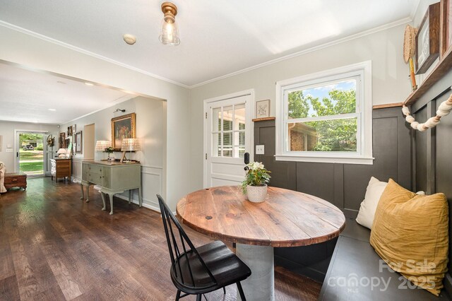 418 Melody Ln, Shelby, NC 28152 - dining area with wood finished floors, plenty of natural light, and crown molding