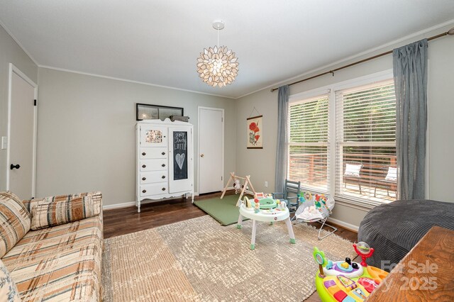 418 Melody Ln, Shelby, NC 28152 - bedroom with wood finished floors, crown molding, and baseboards