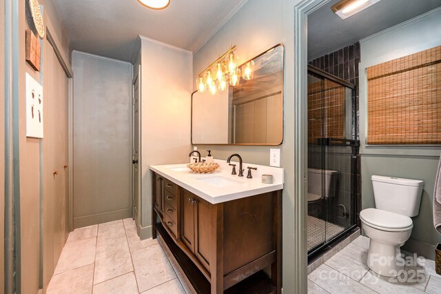 418 Melody Ln, Shelby, NC 28152 - full bathroom featuring double vanity, toilet, a shower stall, tile patterned floors, and ornamental molding