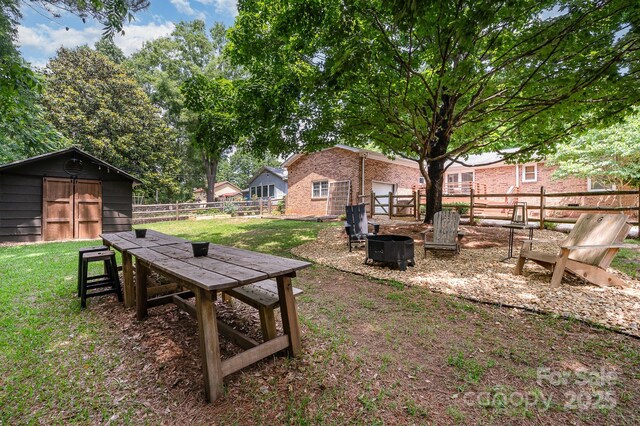 418 Melody Ln, Shelby, NC 28152 - view of yard featuring an outdoor fire pit