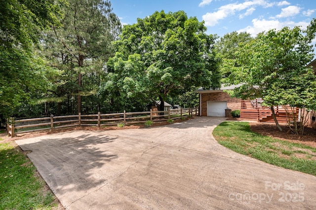 418 Melody Ln, Shelby, NC 28152 - view of front of home with brick siding, concrete driveway, and a garage