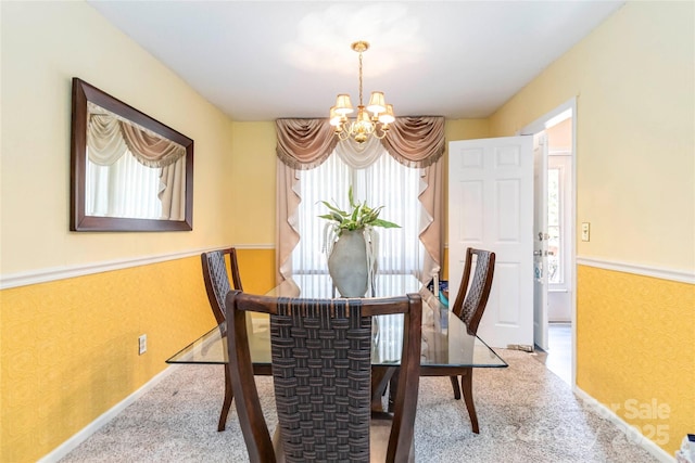 1104 Colony Ct, Gastonia, NC 28056 - dining space featuring a chandelier, carpet floors, and baseboards