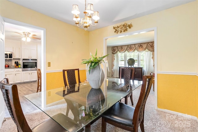 1104 Colony Ct, Gastonia, NC 28056 - dining room featuring a chandelier, baseboards, and light wood-type flooring