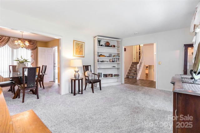 1104 Colony Ct, Gastonia, NC 28056 - living area with a chandelier, carpet, stairway, and baseboards