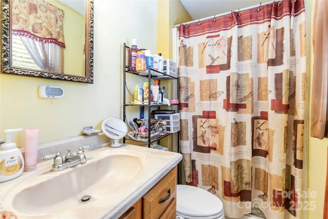 1104 Colony Ct, Gastonia, NC 28056 - full bathroom with toilet, vanity, and a shower with shower curtain