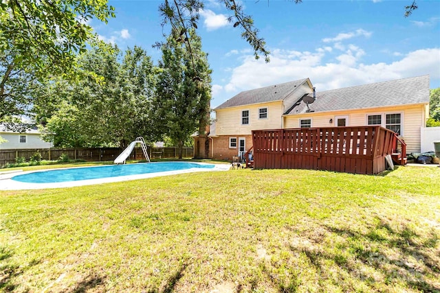 1104 Colony Ct, Gastonia, NC 28056 - view of swimming pool featuring a water slide and a wooden deck