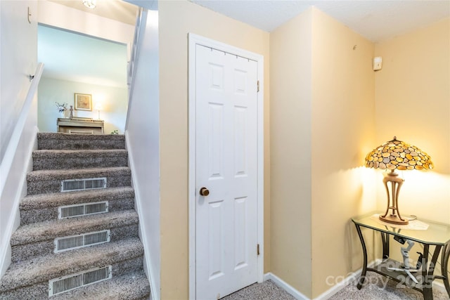 1104 Colony Ct, Gastonia, NC 28056 - staircase featuring carpet and baseboards