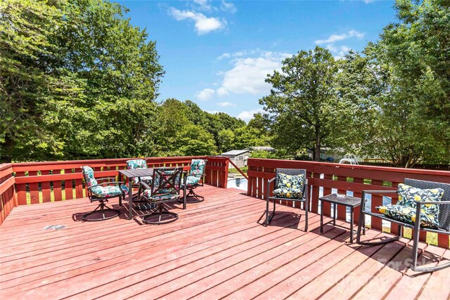 1104 Colony Ct, Gastonia, NC 28056 - wooden deck featuring outdoor dining area