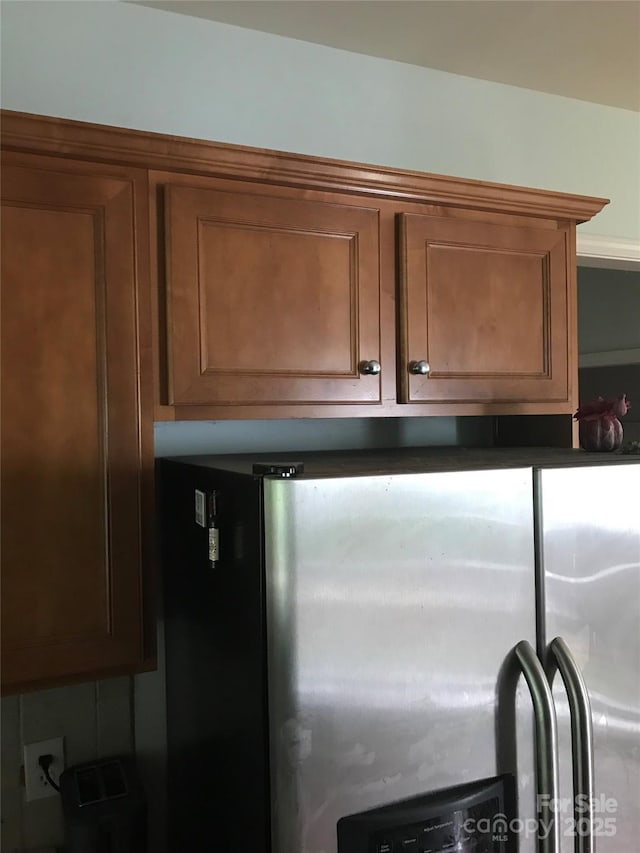 19157 Mallard Dr, Fort Mill, SC 29707 - kitchen view of stainless steel refrigerator with ice dispenser and brown cabinets