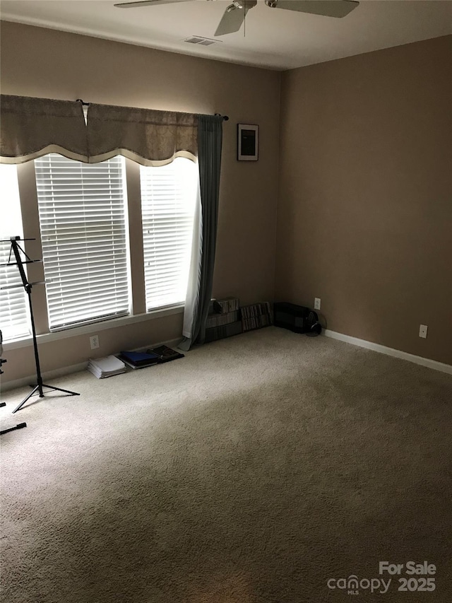 19157 Mallard Dr, Fort Mill, SC 29707 - empty room featuring carpet floors, ceiling fan, and baseboards