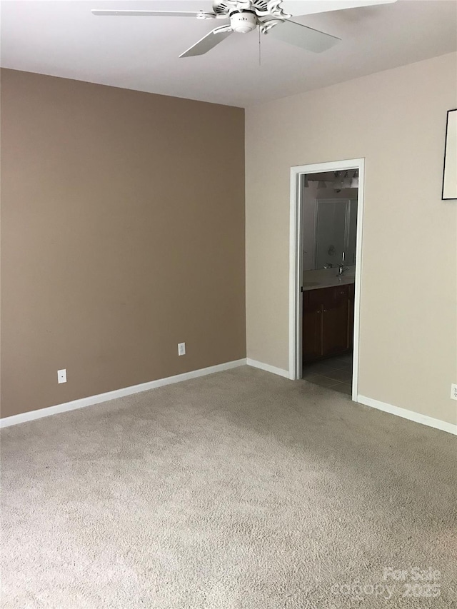 19157 Mallard Dr, Fort Mill, SC 29707 - spare room with light colored carpet, a ceiling fan, and baseboards