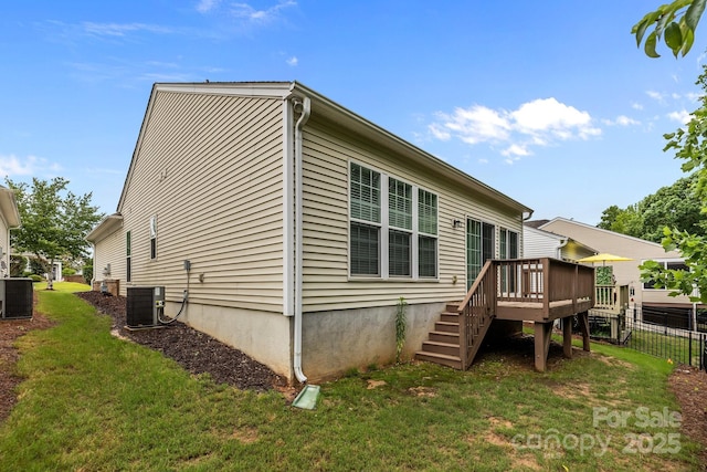 19157 Mallard Dr, Fort Mill, SC 29707 - back of house featuring a wooden deck, stairs, and central AC