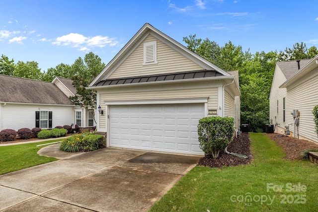 19157 Mallard Dr, Fort Mill, SC 29707 - view of front of property with a standing seam roof, concrete driveway, a front yard, and metal roof