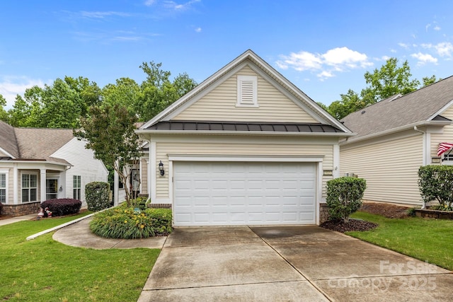 19157 Mallard Dr, Fort Mill, SC 29707 - view of front of house featuring a standing seam roof, concrete driveway, metal roof, a front yard, and an attached garage