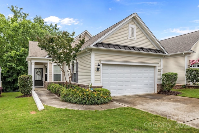 19157 Mallard Dr, Fort Mill, SC 29707 - view of front of property featuring driveway, a front yard, a standing seam roof, roof with shingles, and a garage