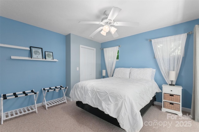 145 Old Still Rd, Maggie Valley, NC 28751 - carpeted bedroom featuring ceiling fan, baseboards, and a closet