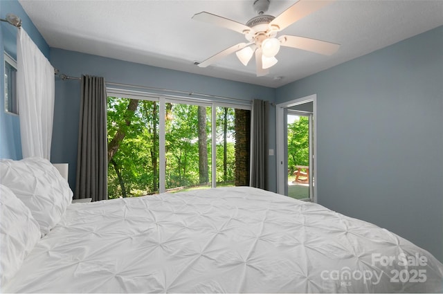 145 Old Still Rd, Maggie Valley, NC 28751 - bedroom with access to outside and a ceiling fan