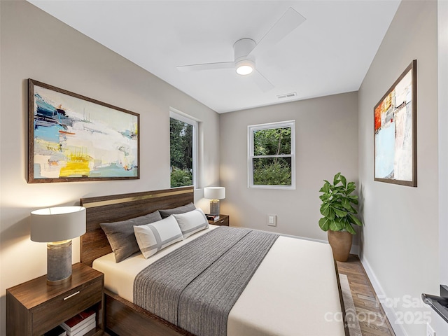 162 Courtland Pl, Asheville, NC 28801 - bedroom with wood finished floors, ceiling fan, and baseboards