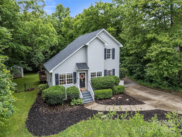 7830 Sarah Dr, Denver, NC 28037 - view of front of home with a shingled roof, a front lawn, and concrete driveway