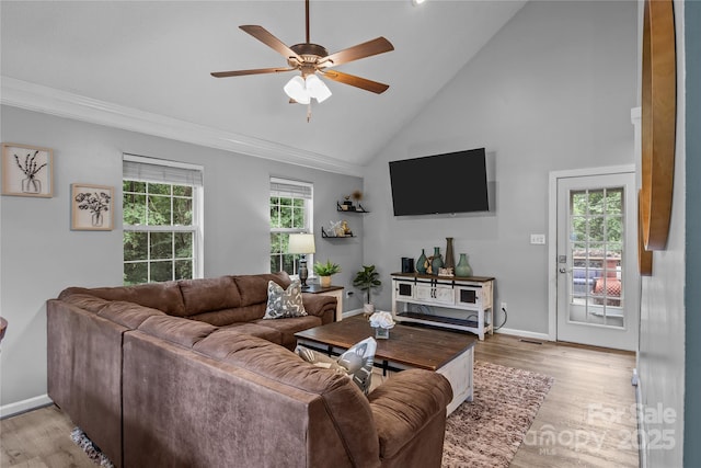 7830 Sarah Dr, Denver, NC 28037 - living room with a ceiling fan, high vaulted ceiling, light wood finished floors, crown molding, and baseboards